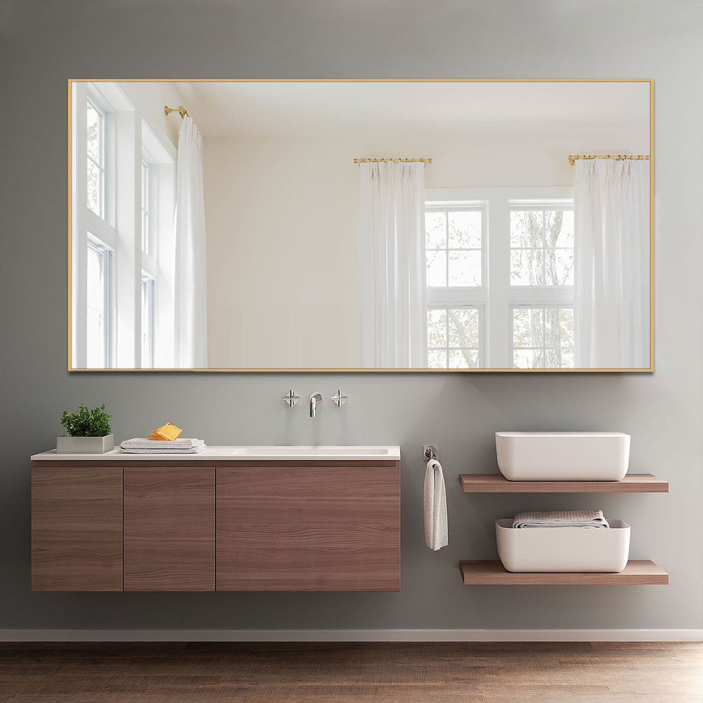 luxury gold mirror above bathroom vanity